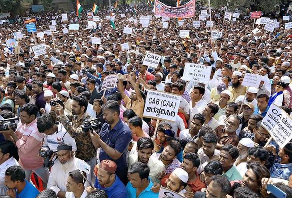 People gathered at Ambedkar Circle in Vijayapura on Tuesday for a protest against CAA and NRC.